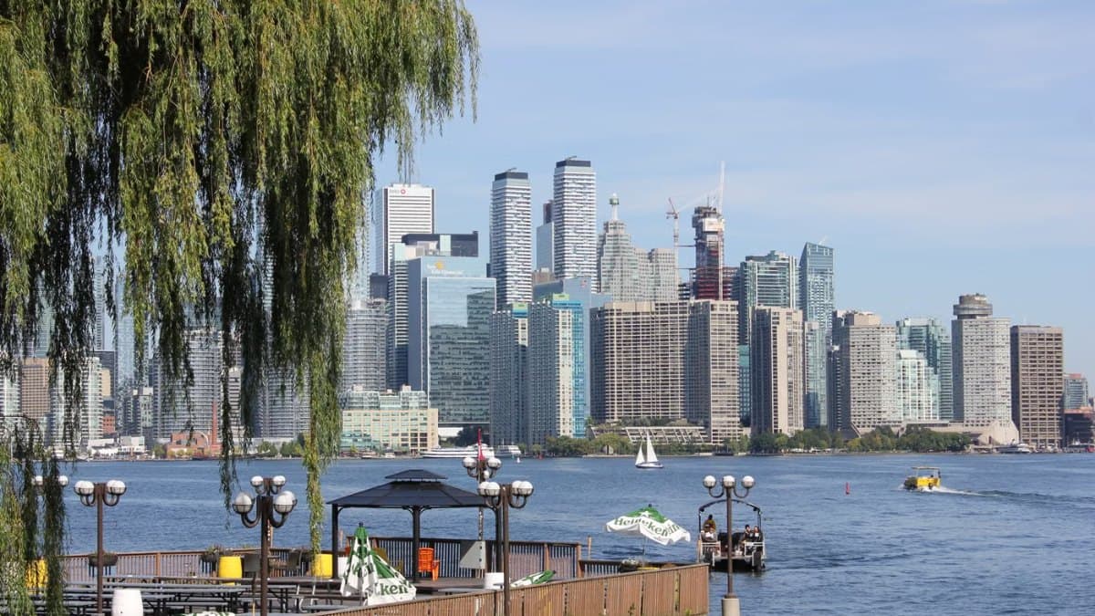 Toronto skyline seen from a waterfront park during the day