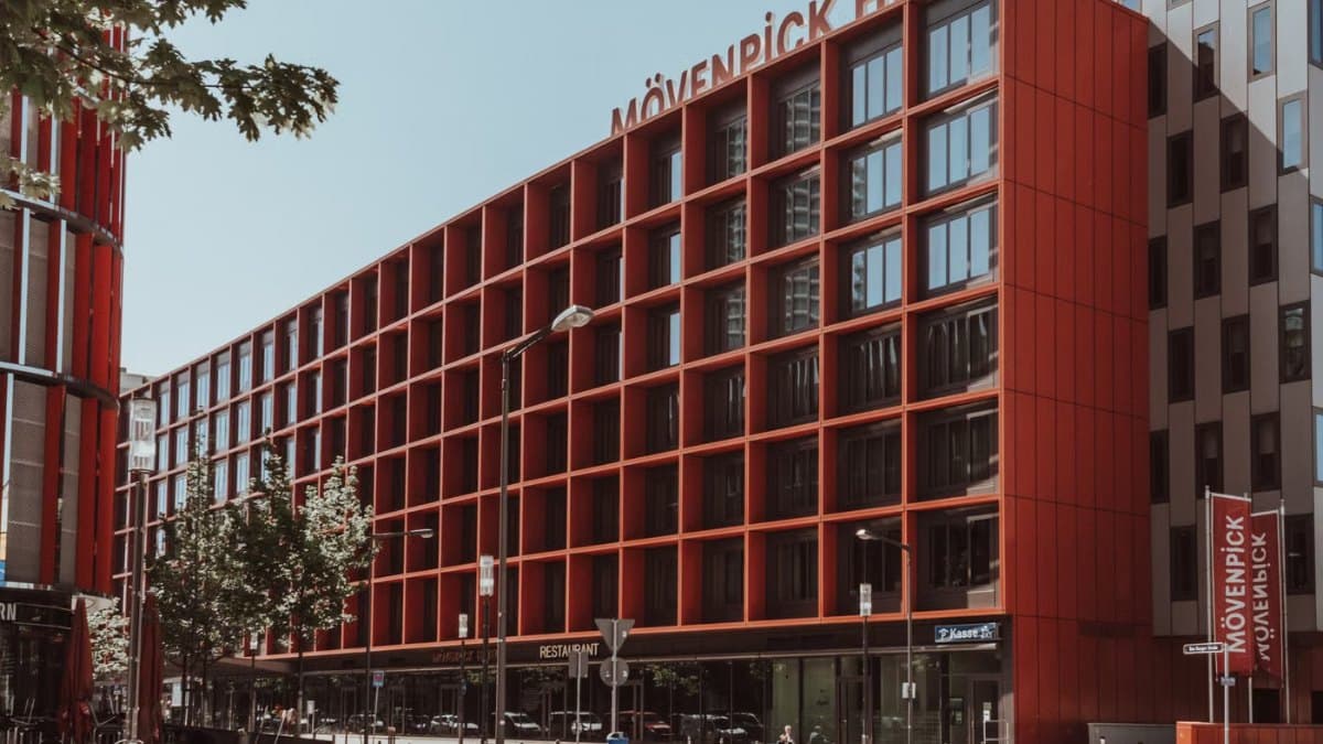Contemporary hotel facade with geometric design in an urban setting