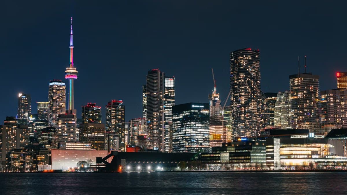 Night view of the Toronto skyline with the illuminated CN Tower