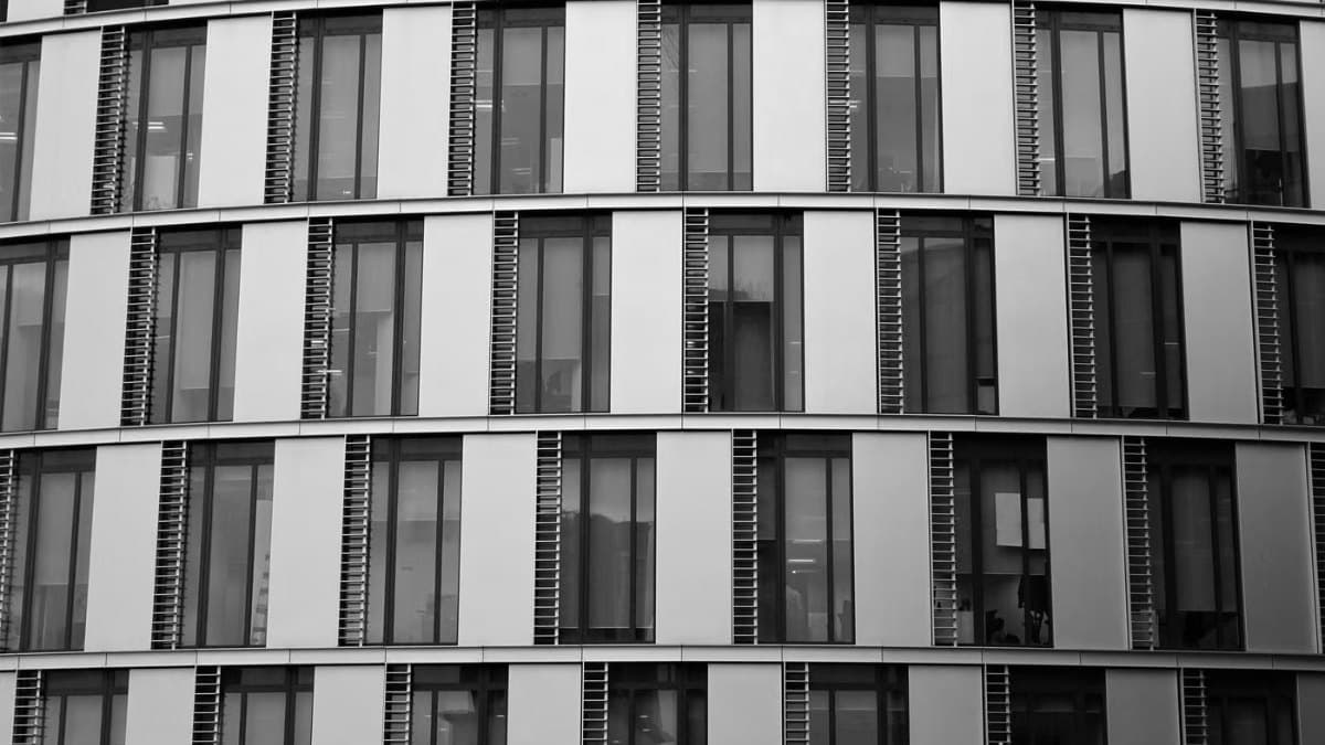 Contemporary office building exterior with glass and steel detailing