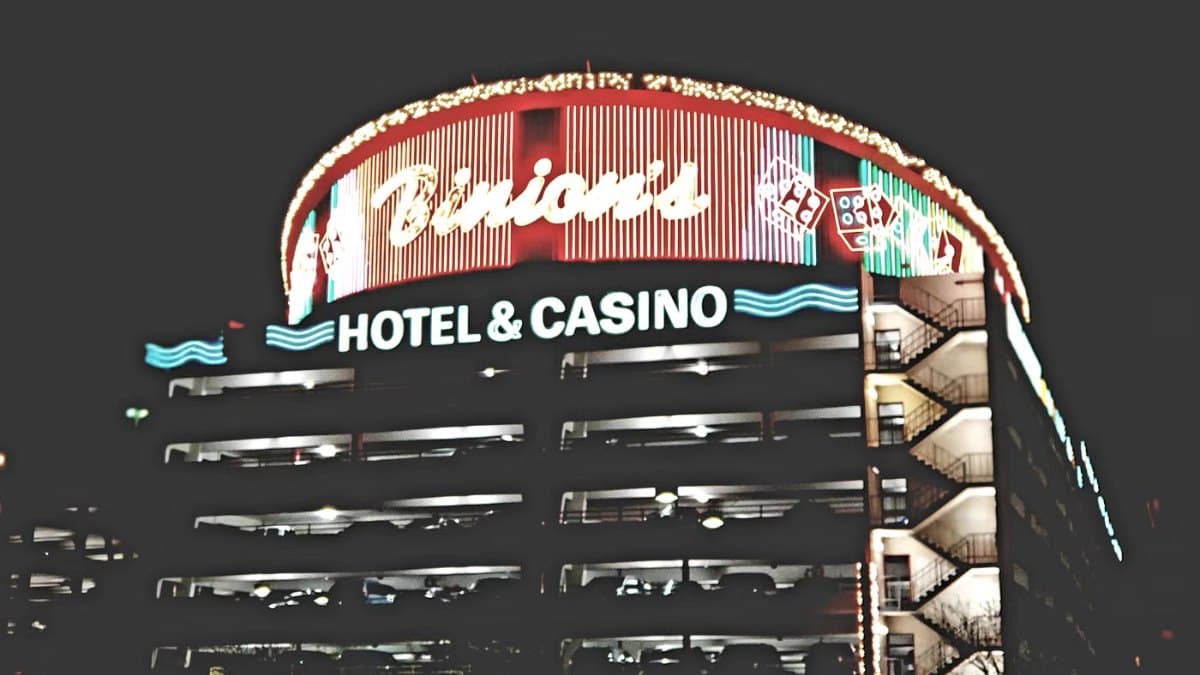 Bright illuminated entertainment venue frontage at night