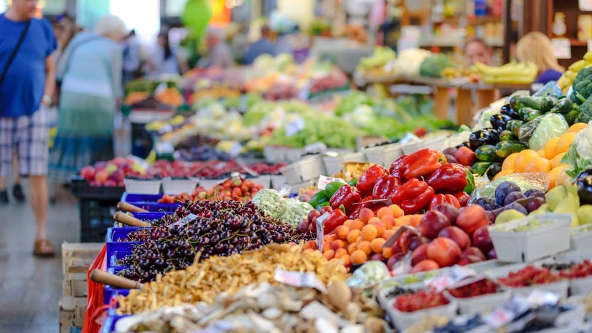 Colourful assortment of fresh fruit and vegetables at a market stall