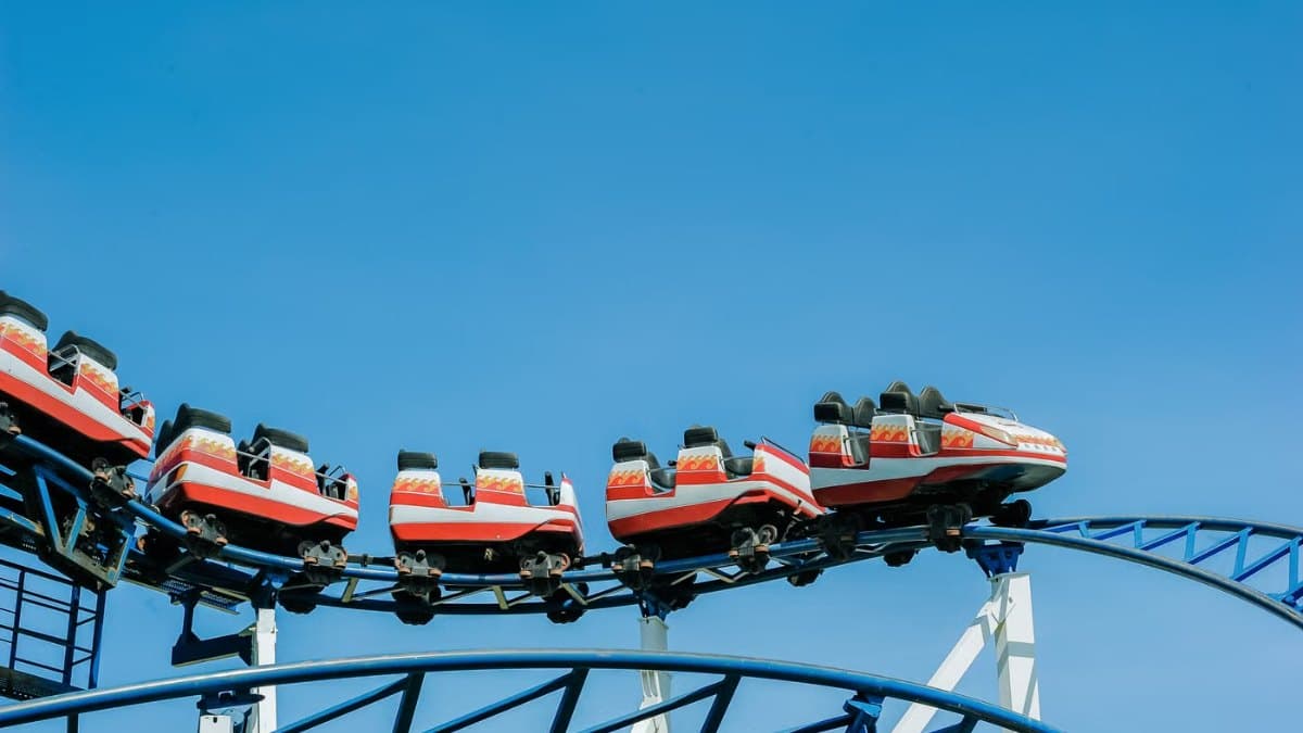 Colourful ride at a fairground against a bright sky