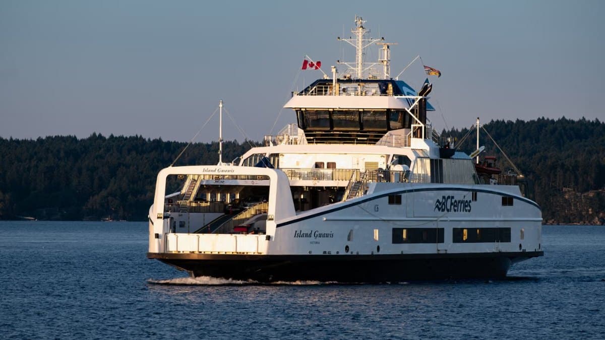 Ferry vessel at sea during sunset