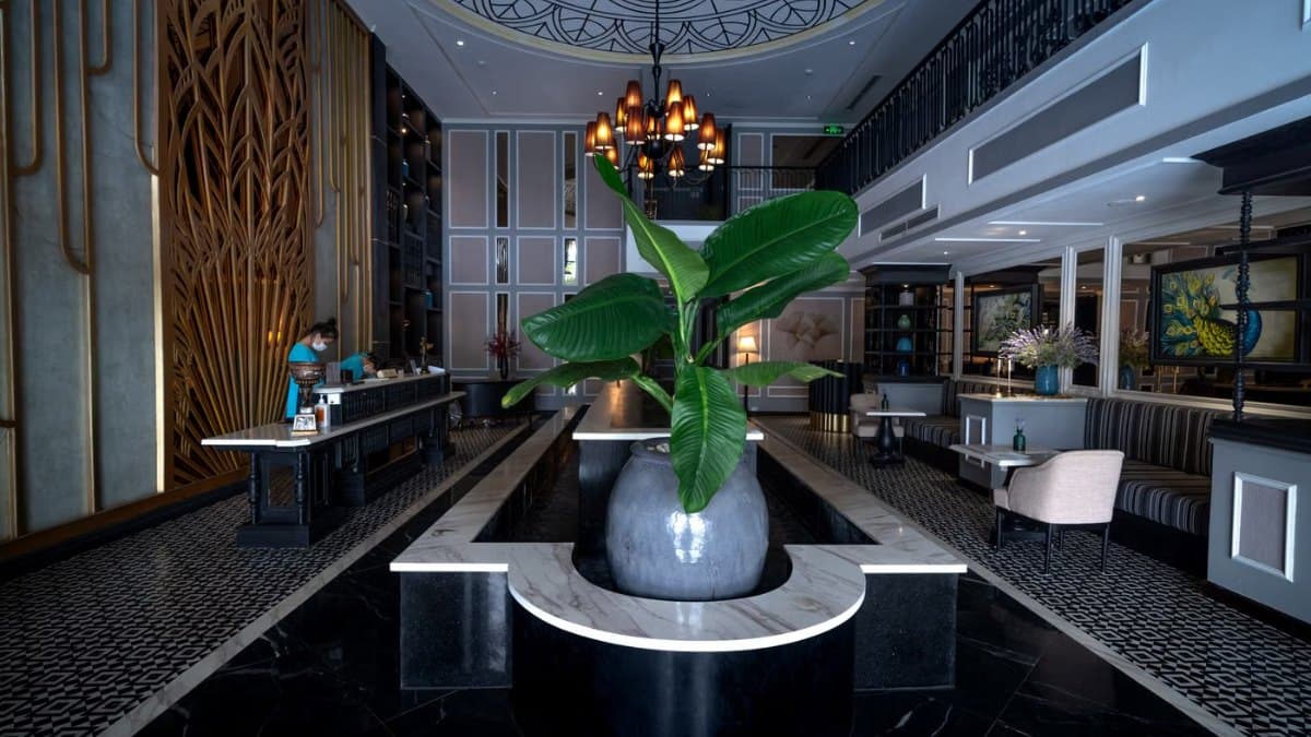 Luxurious hotel lobby with contemporary design and chandelier lighting