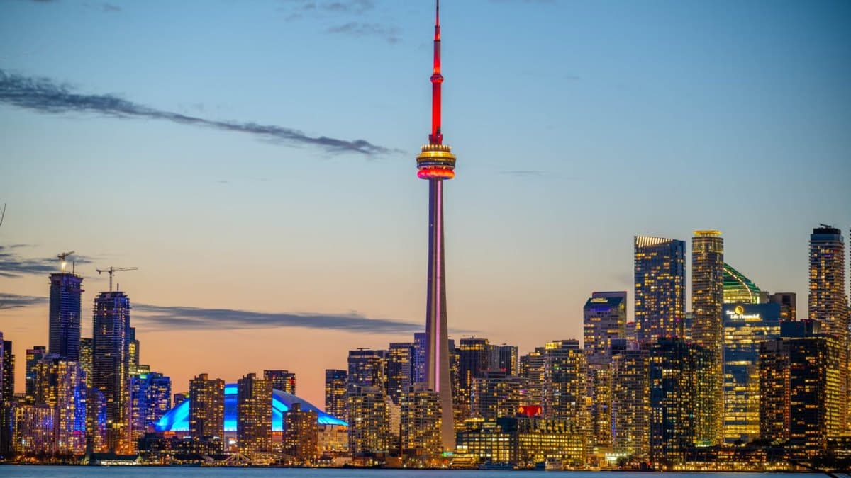 Sunset view of the Toronto skyline with the CN Tower and city lights