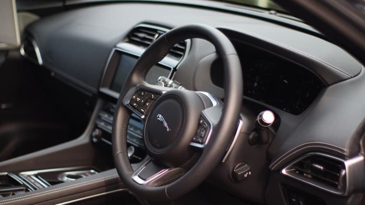 Interior of a luxury car showing dashboard and premium finishes