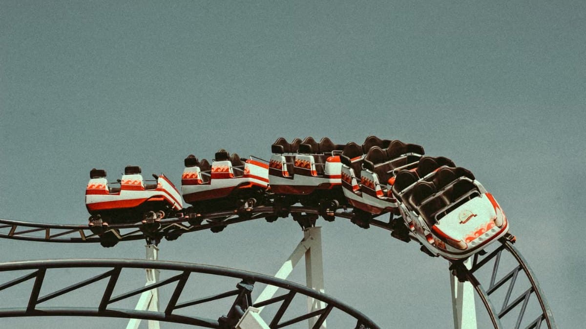 Roller coaster ride with vintage cars at a fairground