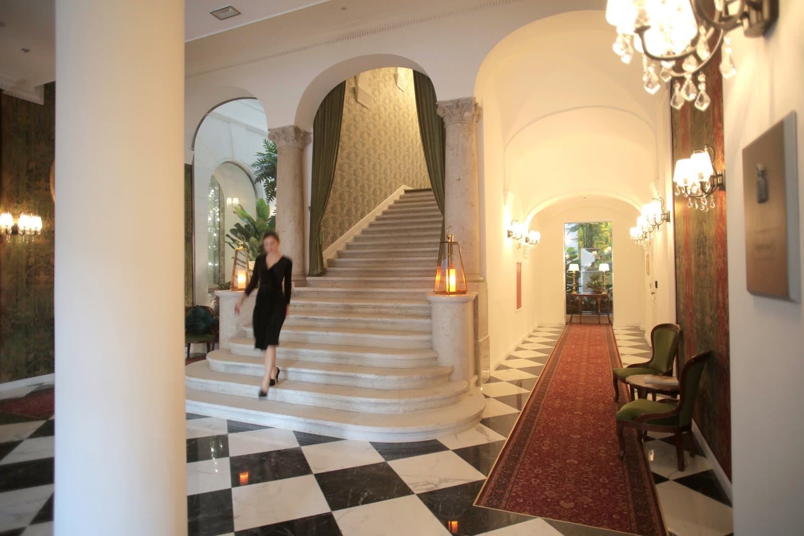 Luxury hotel lobby with a grand staircase